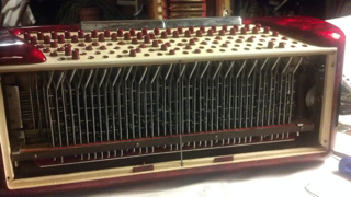 Accordion Bass machinery with buttons stuck inside